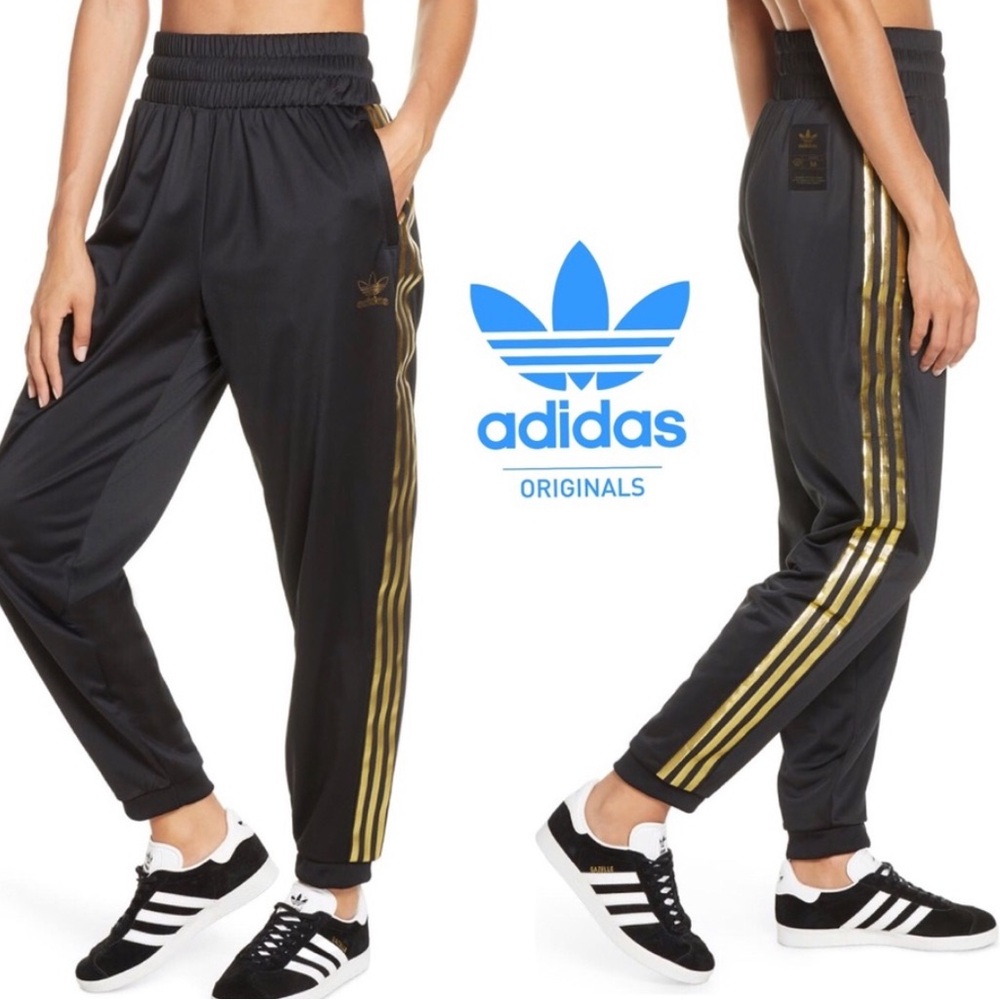NEW ADIDAS ORIGINAL WOMAN’S SUPERSTAR 24K  TREFOIL TRACK PANTS. LARGE (NWT).